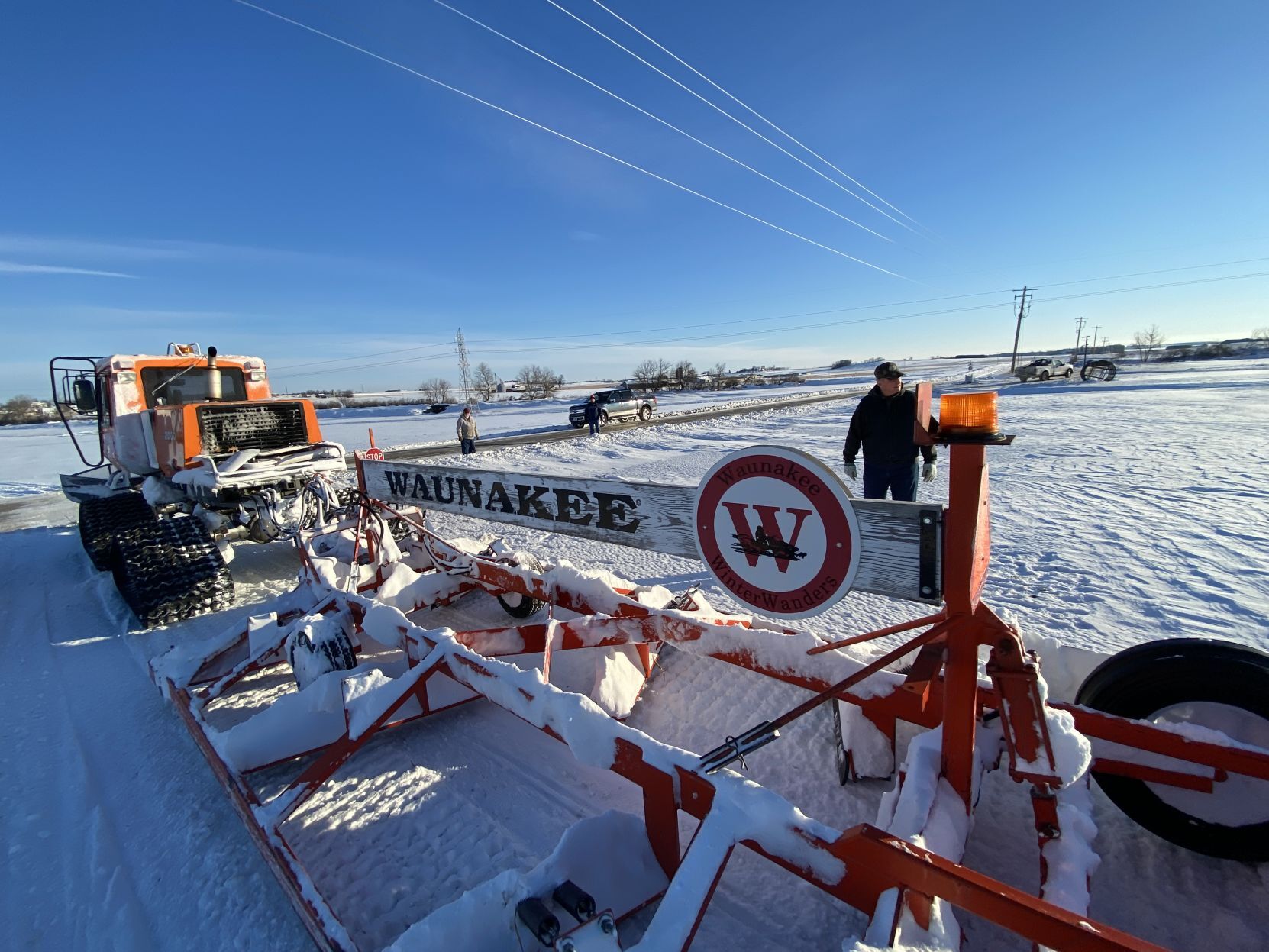Grooming the snowmobile trail
